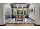 Inviting dining room with backyard views, stylish chandelier, and room for entertaining at 1517 Edenhall Pt, Lake Mary, FL 32746