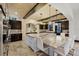 Modern kitchen with stainless steel appliances, tile backsplash, and large island with seating at 1517 Edenhall Pt, Lake Mary, FL 32746