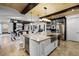 Open kitchen with eat-in island, stainless appliances, and access to the living area for easy entertaining at 1517 Edenhall Pt, Lake Mary, FL 32746