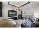 Living room features a tray ceiling, recessed lighting, and a fireplace at 1517 Edenhall Pt, Lake Mary, FL 32746