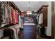 Spacious walk-in closet with an abundance of shelving and storage for clothes and shoes at 1517 Edenhall Pt, Lake Mary, FL 32746