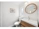 Clean and modern bathroom with stylish mirror, vanity, and fixtures at 2102 Ivanhoe Rd, Orlando, FL 32804