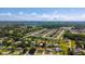 A neighborhood aerial view showcases lush greenery and well-spaced homes at 2356 Date Palm Dr, Edgewater, FL 32141