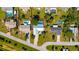 Aerial view of property featuring a backyard pool, well-maintained lawn, and a charming single-story home at 2356 Date Palm Dr, Edgewater, FL 32141