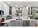 Modern updated kitchen with white cabinets and stainless steel appliances at 2356 Date Palm Dr, Edgewater, FL 32141