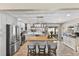 Renovated kitchen with stainless steel appliances, a wood top island, and convenient bar seating at 2356 Date Palm Dr, Edgewater, FL 32141