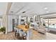 Lovely kitchen featuring wood top island, stainless appliances, and an adjacent seating area at 2356 Date Palm Dr, Edgewater, FL 32141
