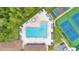 Aerial view of community pool and tennis courts at 2451 Ridgemoor Dr, Orlando, FL 32828