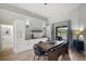 Inviting dining room with a wooden table, built-in bar, and sliding glass doors to the patio at 2451 Ridgemoor Dr, Orlando, FL 32828