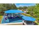 Community playground featuring slides and picnic tables at 2451 Ridgemoor Dr, Orlando, FL 32828