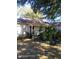 Charming single-story home featuring lush landscaping and mature trees at 2932 Silver Ridge Dr, Orlando, FL 32818