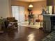 Open concept living room features a breakfast bar, adjacent to the dining area and comfortable seating area at 2932 Silver Ridge Dr, Orlando, FL 32818