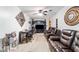 Living room showcasing laminate flooring and ceiling fan at 316 Amanda Ln, Leesburg, FL 34748