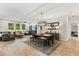 Open-concept living space with comfortable seating and dining area for entertaining at 31924 Geoff, Sorrento, FL 32776