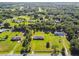 Spacious lot with mature trees and well-maintained lawns, featuring a single-story residence at 3226 Midnight Star Ct, Kissimmee, FL 34744