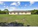 Picture of back of house and large yard at 3226 Midnight Star Ct, Kissimmee, FL 34744