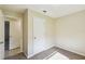 Bedroom featuring a door, carpet, and lots of natural light at 3226 Midnight Star Ct, Kissimmee, FL 34744