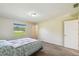 Bedroom with a window view and closet at 3226 Midnight Star Ct, Kissimmee, FL 34744