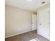 Neutral bedroom showcasing carpet, a window, and white trim at 3226 Midnight Star Ct, Kissimmee, FL 34744