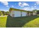 Ranch home with a two-car garage, well-manicured lawn, and nice landscaping at 3226 Midnight Star Ct, Kissimmee, FL 34744