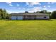Charming one-story home with attached two-car garage and a spacious, well-maintained lawn at 3226 Midnight Star Ct, Kissimmee, FL 34744