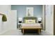 Bright bedroom with modern furnishings, a decorative rug, and a whimsical dinosaur print at 349 Sol Vista Dr, Dundee, FL 33838