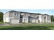 New construction townhomes featuring attached garages and modern exteriors at 349 Sol Vista Dr, Dundee, FL 33838