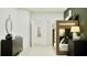 Stylish bedroom with a wooden bunk bed, sleek black dresser, and trendy decor at 373 Sol Vista Dr, Dundee, FL 33838