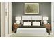 Serene bedroom featuring a plush bed, stylish nightstands, and soothing natural light at 373 Sol Vista Dr, Dundee, FL 33838