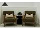 Cozy living room featuring two comfortable armchairs and a stylish side table at 373 Sol Vista Dr, Dundee, FL 33838