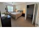 Cozy bedroom featuring a comfortable bed, ceiling fan, and ample natural light with closet at 4002 San Gallo Dr # 105, Kissimmee, FL 34741