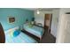 Bedroom with two twin beds and a ceiling fan at 4002 San Gallo Dr # 105, Kissimmee, FL 34741