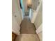 Hallway featuring carpet and linen closet at 4002 San Gallo Dr # 105, Kissimmee, FL 34741