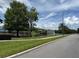 Scenic view of a pond with fountain and surrounding trees at 4002 San Gallo Dr # 105, Kissimmee, FL 34741