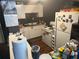 Functional kitchen with white cabinets and appliances, offering ample space for cooking at 4035 Nimons St, Orlando, FL 32811