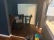 Cozy living room featuring dark walls, wood floors and bright natural light at 4035 Nimons St, Orlando, FL 32811