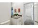 A well-lit bathroom with a modern vanity, sleek fixtures, and neutral tones at 4367 Rhyme St, Kissimmee, FL 34746