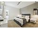 Modern bedroom featuring a king-size bed and stylish decor at 4367 Rhyme St, Kissimmee, FL 34746