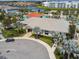 Aerial view of a clubhouse and landscaping located in a Primary-planned community with a lazy river at 4367 Rhyme St, Kissimmee, FL 34746