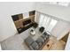 Bright living room with modern TV, decor and comfortable seating with natural light at 4367 Rhyme St, Kissimmee, FL 34746