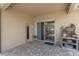 Covered patio with access to the screened in porch, and stylish outdoor decor at 5226 Smokey Water Ln, Oviedo, FL 32765