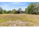 Quaint single story home surrounded by expansive fields and mature trees at 538 Murray St, Osteen, FL 32764