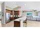 Gourmet kitchen featuring granite countertops, stainless steel appliances, and a breakfast bar with room for seating at 538 Murray St, Osteen, FL 32764