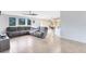 Spacious living room with a large sectional couch and lots of natural light at 538 Murray St, Osteen, FL 32764