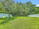 Spacious backyard perfect for outdoor activities and relaxation with a white fence surround at 5852 Stafford Springs Trl, Orlando, FL 32829