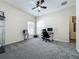 Bedroom featuring neutral walls, carpeted flooring, ample natural light, and ceiling fan at 5852 Stafford Springs Trl, Orlando, FL 32829