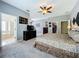 Spacious main bedroom featuring a view of the ensuite bathroom and walk-in closet at 5852 Stafford Springs Trl, Orlando, FL 32829