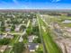 Aerial view of the home showing proximity to the neighborhood and wetlands to the North at 609 Brockway Ave, Orlando, FL 32807