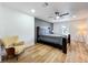 Beautiful bedroom featuring a ceiling fan and wood-look flooring at 609 Brockway Ave, Orlando, FL 32807