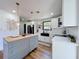 Stylish kitchen with a butcher block island, white cabinets, and stainless steel appliances at 609 Brockway Ave, Orlando, FL 32807